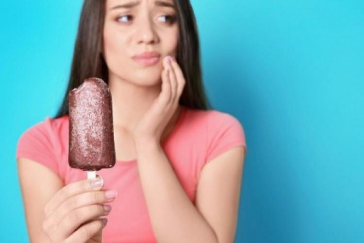 Почему зубы реагируют на сладкое?